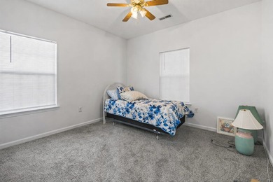 Welcome to this beautiful 2-bedroom, 2-bathroom top-floor end on Palmetto Greens Golf and Country Club in South Carolina - for sale on GolfHomes.com, golf home, golf lot