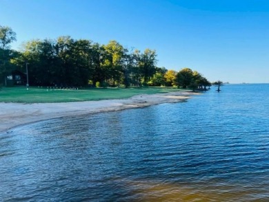 This is a cleared but wooded, 1+acre lot in the Pendleton Harbor on Pendleton Harbor in Texas - for sale on GolfHomes.com, golf home, golf lot
