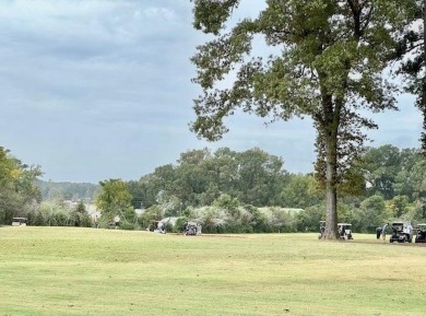 This is a cleared but wooded, 1+acre lot in the Pendleton Harbor on Pendleton Harbor in Texas - for sale on GolfHomes.com, golf home, golf lot