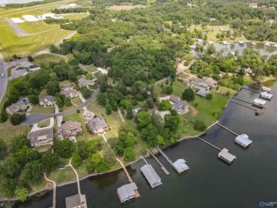 LOCATION,LOCATION,LOCATION! FULL BRICK 3 BEDROOM 1 BATH ON on Gunters Landing in Alabama - for sale on GolfHomes.com, golf home, golf lot