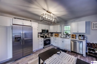 Welcome Home! Step into this fully updated 3-bedroom, 2-bath gem on Pine Valley Golf Resort in Kentucky - for sale on GolfHomes.com, golf home, golf lot