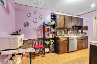 Welcome to this charming 2-bedroom, 1-bathroom condo in Covered on Pine Brook Golf Course in New Jersey - for sale on GolfHomes.com, golf home, golf lot