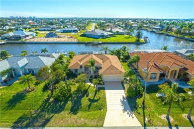 Highly sought-after SW Cape area GULF ACCESS POOL HOME! BOASTS on Royal Tee Country Club in Florida - for sale on GolfHomes.com, golf home, golf lot