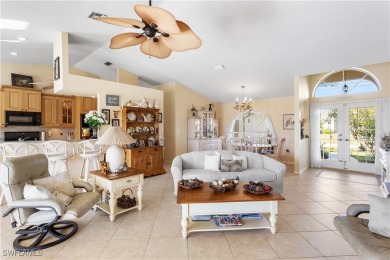Highly sought-after SW Cape area GULF ACCESS POOL HOME! BOASTS on Royal Tee Country Club in Florida - for sale on GolfHomes.com, golf home, golf lot