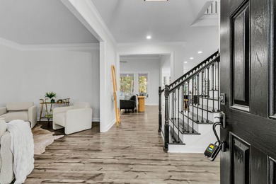 Welcome home to this stunning 5-bedroom, 4-bath home plus bonus on Dunes West Golf Club in South Carolina - for sale on GolfHomes.com, golf home, golf lot