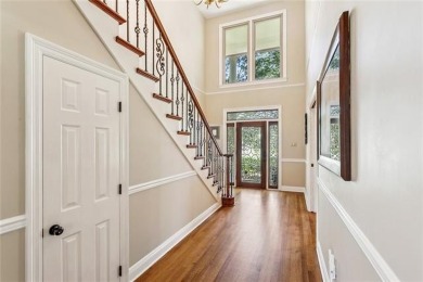 Discover refined living nestled in the Beau Chene community of on Beau Chene Country Club in Louisiana - for sale on GolfHomes.com, golf home, golf lot