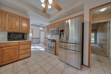 Welcome home to this beautiful 3-bedroom, 2-bathroom retreat on Hide-A-Way Lake Golf Course in Texas - for sale on GolfHomes.com, golf home, golf lot