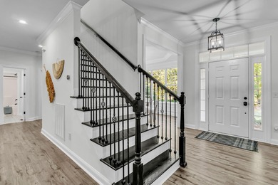 Welcome home to this stunning 5-bedroom, 4-bath home plus bonus on Dunes West Golf Club in South Carolina - for sale on GolfHomes.com, golf home, golf lot