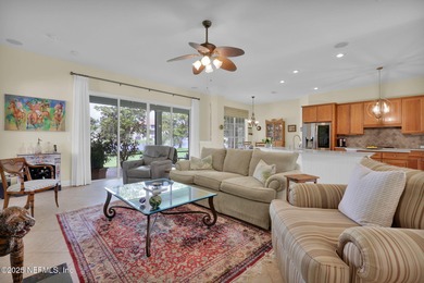 This elegant David Weekley home offers panoramic water views on The Palencia Club in Florida - for sale on GolfHomes.com, golf home, golf lot