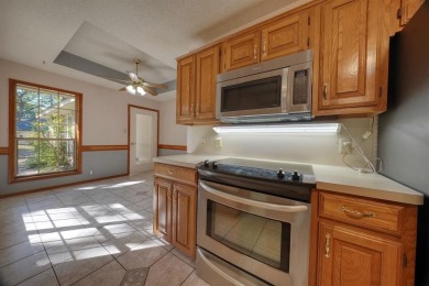 Welcome home to this beautiful 3-bedroom, 2-bathroom retreat on Hide-A-Way Lake Golf Course in Texas - for sale on GolfHomes.com, golf home, golf lot