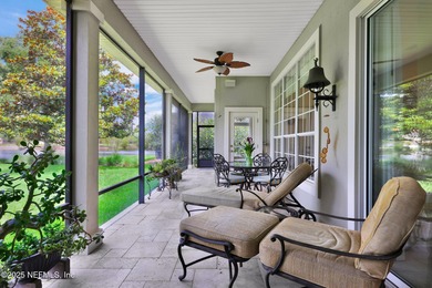 This elegant David Weekley home offers panoramic water views on The Palencia Club in Florida - for sale on GolfHomes.com, golf home, golf lot