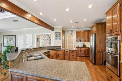 Discover refined living nestled in the Beau Chene community of on Beau Chene Country Club in Louisiana - for sale on GolfHomes.com, golf home, golf lot