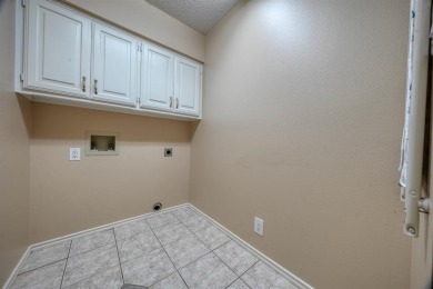 Welcome home to this beautiful 3-bedroom, 2-bathroom retreat on Hide-A-Way Lake Golf Course in Texas - for sale on GolfHomes.com, golf home, golf lot