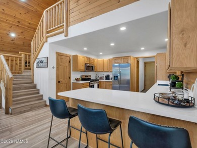 Discover Northern Arizona living in this rare true log cabin on Highland Meadows Golf Club in Arizona - for sale on GolfHomes.com, golf home, golf lot