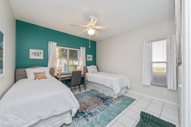 Light and bright first-floor END UNIT with serene lake views in on Glen Eagle Golf and Country Club in Florida - for sale on GolfHomes.com, golf home, golf lot