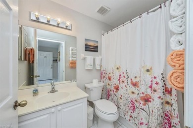 Light and bright first-floor END UNIT with serene lake views in on Glen Eagle Golf and Country Club in Florida - for sale on GolfHomes.com, golf home, golf lot