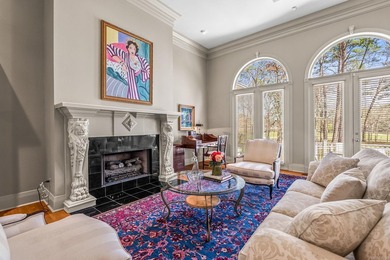 Overlooking the scenic fairways and tranquil lakes of Chenal's on Chenal Country Club - Bear Den Mountain in Arkansas - for sale on GolfHomes.com, golf home, golf lot