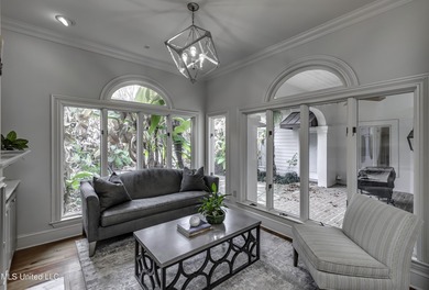 Experience timeless Southern charm blended beautifully with on Annandale Golf Club in Mississippi - for sale on GolfHomes.com, golf home, golf lot