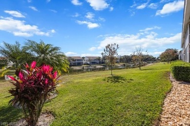 Light and bright first-floor END UNIT with serene lake views in on Glen Eagle Golf and Country Club in Florida - for sale on GolfHomes.com, golf home, golf lot