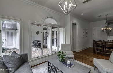 Experience timeless Southern charm blended beautifully with on Annandale Golf Club in Mississippi - for sale on GolfHomes.com, golf home, golf lot