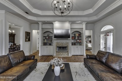 Experience timeless Southern charm blended beautifully with on Annandale Golf Club in Mississippi - for sale on GolfHomes.com, golf home, golf lot