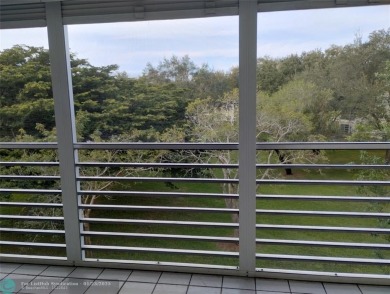 LIVE IN PRESTIGIOUS CAYMAN WAY ON AVENUE OF THE STARS! STEPS TO on Wynmoor Golf Course in Florida - for sale on GolfHomes.com, golf home, golf lot