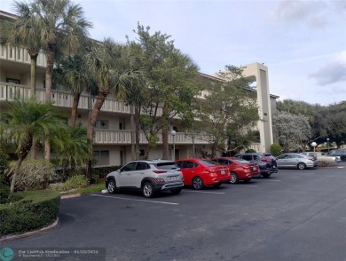 LIVE IN PRESTIGIOUS CAYMAN WAY ON AVENUE OF THE STARS! STEPS TO on Wynmoor Golf Course in Florida - for sale on GolfHomes.com, golf home, golf lot