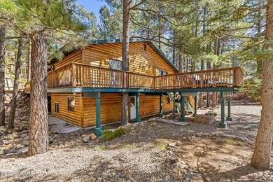 Tucked away on a rare 1/3+ acre homesite backing the dramatic on Pinewood Country Club in Arizona - for sale on GolfHomes.com, golf home, golf lot