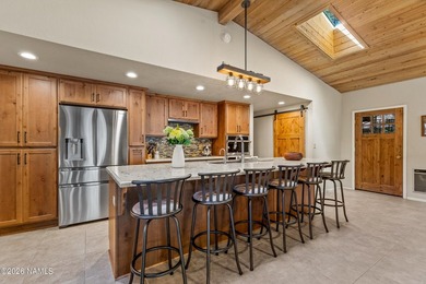 Tucked away on a rare 1/3+ acre homesite backing the dramatic on Pinewood Country Club in Arizona - for sale on GolfHomes.com, golf home, golf lot