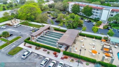 LIVE IN PRESTIGIOUS CAYMAN WAY ON AVENUE OF THE STARS! STEPS TO on Wynmoor Golf Course in Florida - for sale on GolfHomes.com, golf home, golf lot