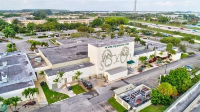 LIVE IN PRESTIGIOUS CAYMAN WAY ON AVENUE OF THE STARS! STEPS TO on Wynmoor Golf Course in Florida - for sale on GolfHomes.com, golf home, golf lot