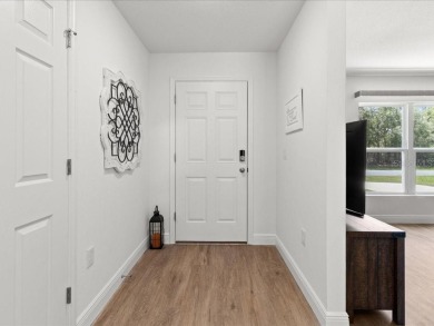 Built in 2023 and thoughtfully upgraded with luxury vinyl plank on Marion Oaks Country Club in Florida - for sale on GolfHomes.com, golf home, golf lot