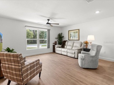 Built in 2023 and thoughtfully upgraded with luxury vinyl plank on Marion Oaks Country Club in Florida - for sale on GolfHomes.com, golf home, golf lot