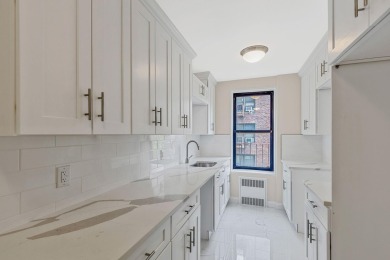 Fully renovated two-bedroom, one-bathroom end unit with elevator on Forest Park Golf Course in New York - for sale on GolfHomes.com, golf home, golf lot