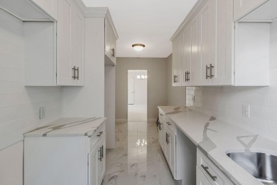 Fully renovated two-bedroom, one-bathroom end unit with elevator on Forest Park Golf Course in New York - for sale on GolfHomes.com, golf home, golf lot