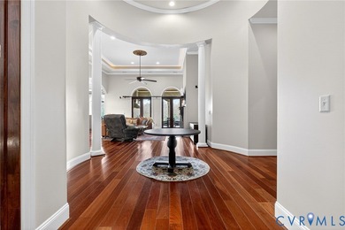 Private golf course retreat in Williamsburg offering timeless on Williamsburg National Golf Club in Virginia - for sale on GolfHomes.com, golf home, golf lot