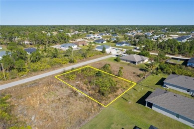 Prime Vacant Lot with Southern Rear Exposure in Lehigh Acres on River Hall Country Club in Florida - for sale on GolfHomes.com, golf home, golf lot