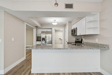 Under contract-accepting backup offers. First-Floor Availability on East Bay Golf Club in Florida - for sale on GolfHomes.com, golf home, golf lot