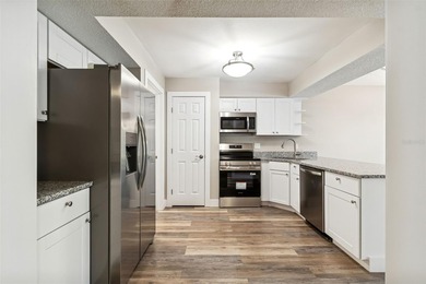 Under contract-accepting backup offers. First-Floor Availability on East Bay Golf Club in Florida - for sale on GolfHomes.com, golf home, golf lot