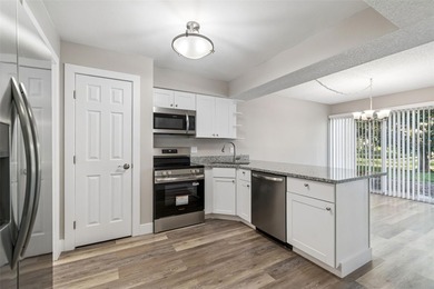 Under contract-accepting backup offers. First-Floor Availability on East Bay Golf Club in Florida - for sale on GolfHomes.com, golf home, golf lot