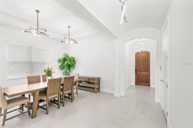 Welcome to 8210 Topsail - a stunning Toll Brothers Madeira floor on Orange County National Golf Center and Lodge in Florida - for sale on GolfHomes.com, golf home, golf lot