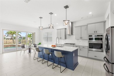 Welcome to 8210 Topsail - a stunning Toll Brothers Madeira floor on Orange County National Golf Center and Lodge in Florida - for sale on GolfHomes.com, golf home, golf lot