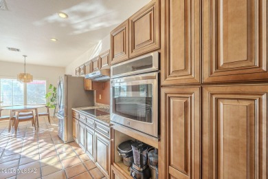 This beautiful home is such an incredible find! It is one of the on Pusch Ridge Golf Course in Arizona - for sale on GolfHomes.com, golf home, golf lot