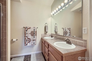 Tucked away on a peaceful cul-de-sac and surrounded by open on Pelican Lakes Golf and Country Club in Colorado - for sale on GolfHomes.com, golf home, golf lot