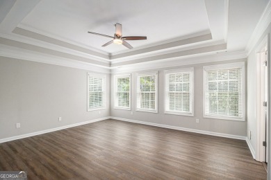 Stunning stucco home in the highly sought-after Summer Grove on Summergrove Golf Club in Georgia - for sale on GolfHomes.com, golf home, golf lot