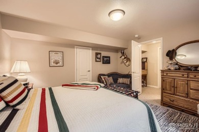 Tucked away on a peaceful cul-de-sac and surrounded by open on Pelican Lakes Golf and Country Club in Colorado - for sale on GolfHomes.com, golf home, golf lot