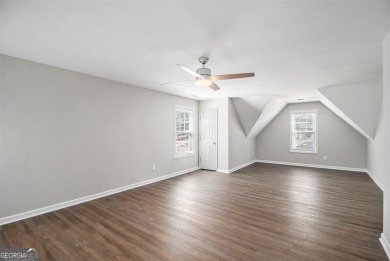 Stunning stucco home in the highly sought-after Summer Grove on Summergrove Golf Club in Georgia - for sale on GolfHomes.com, golf home, golf lot