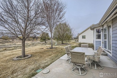 Tucked away on a peaceful cul-de-sac and surrounded by open on Pelican Lakes Golf and Country Club in Colorado - for sale on GolfHomes.com, golf home, golf lot