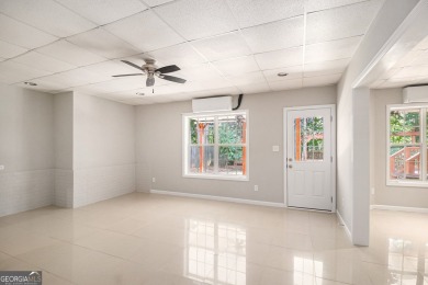 Stunning stucco home in the highly sought-after Summer Grove on Summergrove Golf Club in Georgia - for sale on GolfHomes.com, golf home, golf lot