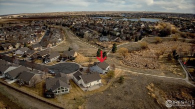 Tucked away on a peaceful cul-de-sac and surrounded by open on Pelican Lakes Golf and Country Club in Colorado - for sale on GolfHomes.com, golf home, golf lot